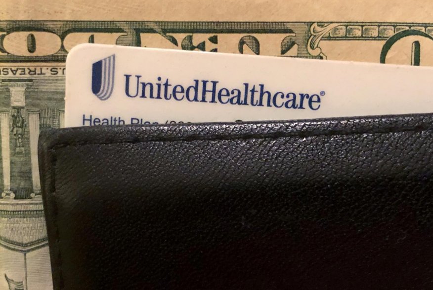 A UnitedHealth Group health insurance card is seen in a wallet in this picture illustration October 14, 2019. REUTERS/Lucy Nicholson/Illustration
