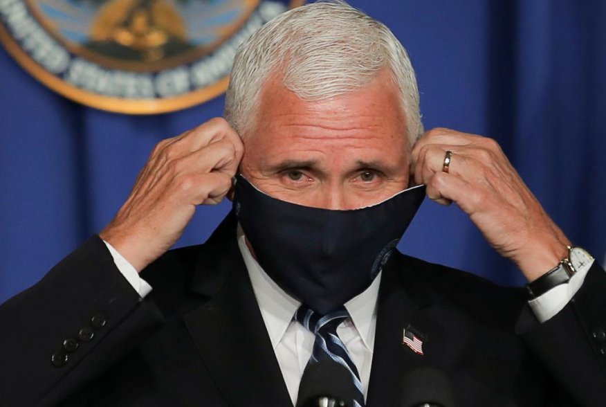 U.S. Vice President Mike Pence takes off his protective face mask to speak as he leads a White House coronavirus disease (COVID-19) task force briefing at the U.S. Education Department in Washington, U.S., July 8, 2020. REUTERS/Carlos Barria