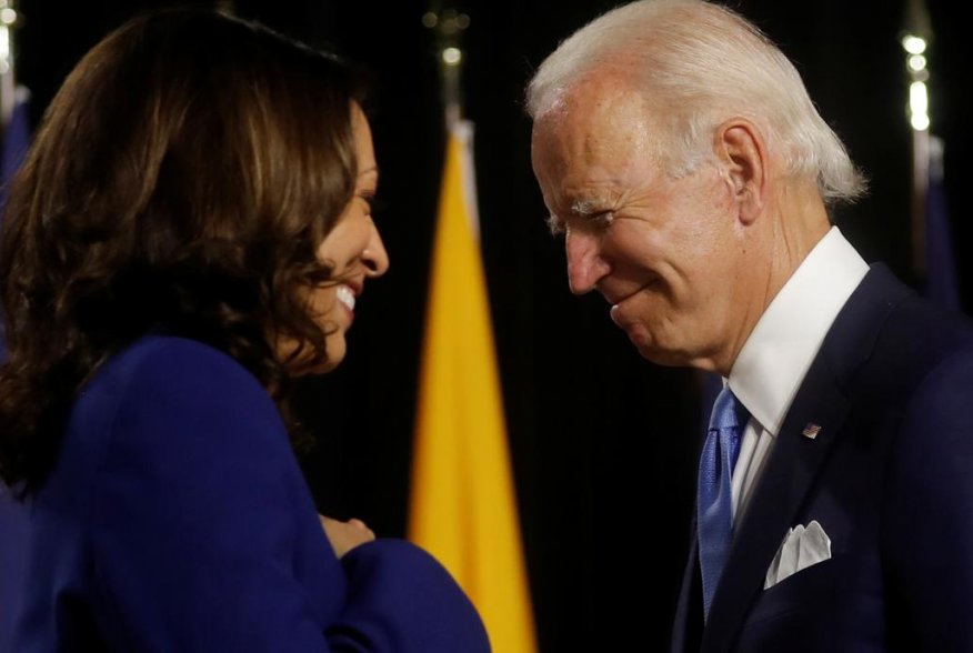 Democratic presidential candidate and former Vice President Joe Biden and vice presidential candidate Senator Kamala Harris are seen at the stage during a campaign event, their first joint appearance since Biden named Harris as his running mate, at Alexis