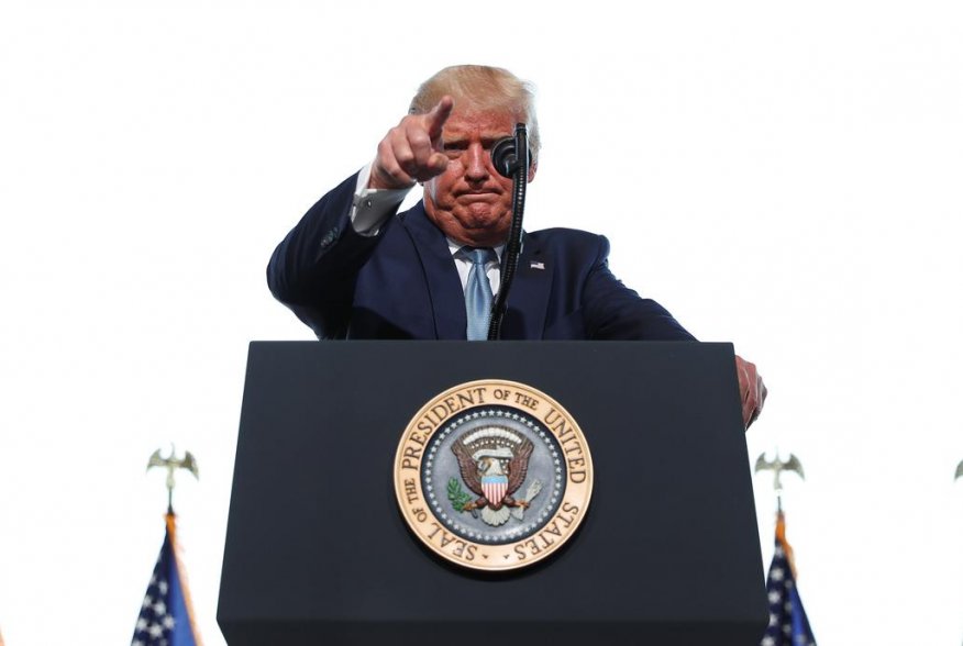 U.S. President Donald Trump points as he delivers remarks during a campaign event at Yuma International Airport in Yuma, Arizona, U.S., August 18, 2020. REUTERS/Tom Brenner