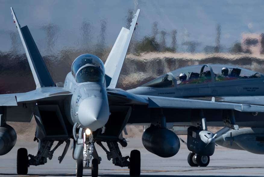 Two E/A-18G Growlers assigned to Electronic Attack Squadron (VAQ) 131 from Naval Air Station Whidbey Island, Washington, taxi at Nellis Air Force Base (AFB), Nevada, Jan. 23, 2020. 