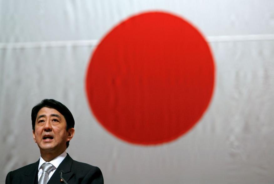 Japan's Prime Minister Shinzo Abe addresses cadets during a graduation ceremony at the National Defense Academy of Japan in Yokosuka, south of Tokyo, March 18, 2007. REUTERS/Kiyoshi Ota (JAPAN)