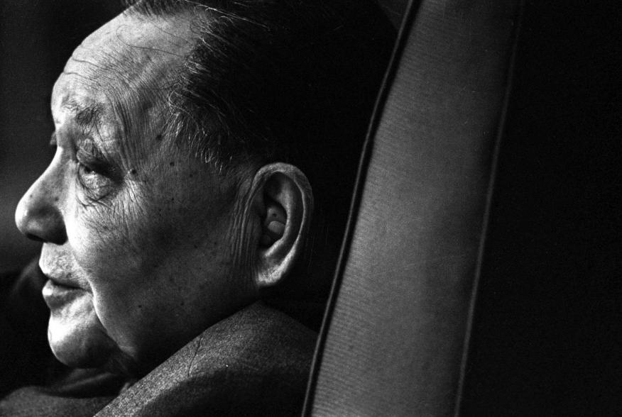 Deng Xiaoping, the initiator of China's reform and opening-up policy, is seen at the Great Hall of the People during a meeting in Beijing in this 1985 file photo. As China battles an economic slowdown that could test Communist Party control, its leaders a