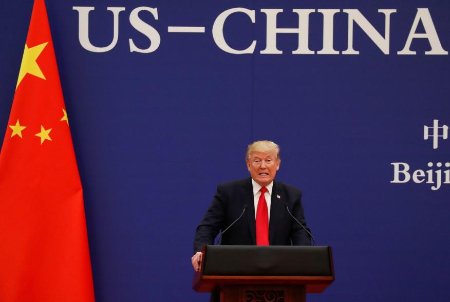 U.S. President Donald Trump delivers his speech as he and China's President Xi Jinping meet business leaders at the Great Hall of the People in Beijing, China, November 9, 2017. REUTERS/Damir Sagolj