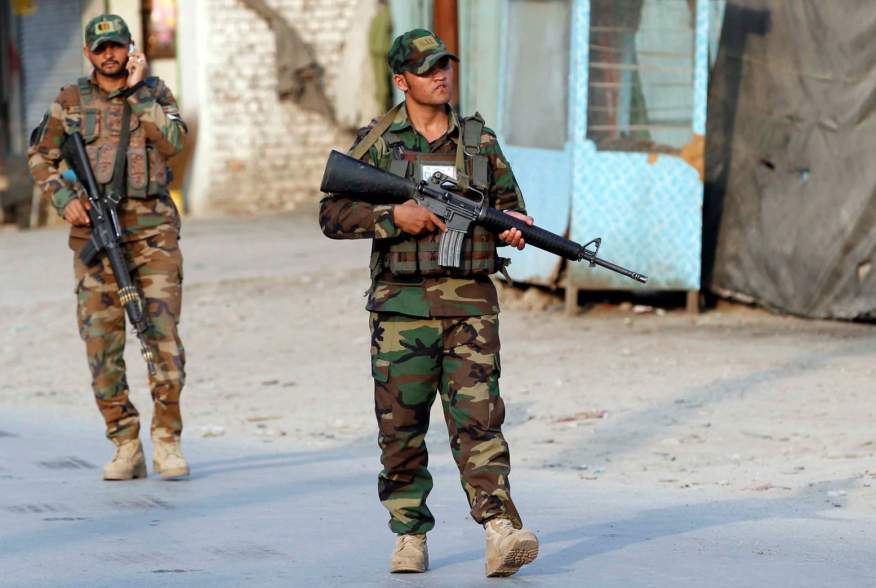 Afghan National Army (ANA) soldiers arrive at the site of a suicide car bomb blast in Jalalabad, Afghanistan October 25, 2019.REUTERS/Parwiz