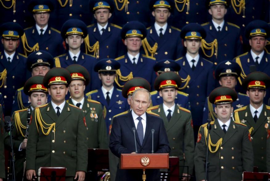 Russian President Vladimir Putin delivers a speech at the opening of the Army-2015 international military forum in Kubinka, outside Moscow, Russia, June 16, 2015. Putin said on Tuesday Russia would add more than 40 new intercontinental ballistic missiles 