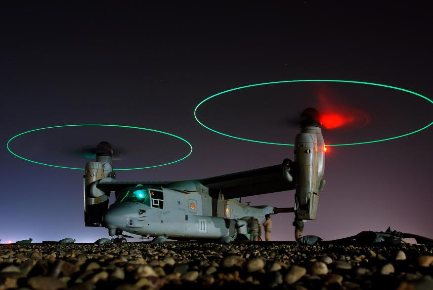 Crew members refuel an MV-22 before a night mission in Iraq, 2008