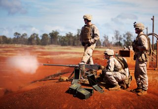  Machine gunners 1st Battalion, 3rd Marine Regiment, fire the .50 caliber M2 Browning machine gun during crew-served weapons training at Schofield Barracks, Hawaii, Oct. 8 through 10, 2013. Flickr / Marines