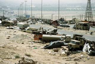 https://en.wikipedia.org/wiki/Highway_of_Death#/media/File:Demolished_vehicles_line_Highway_80_on_18_Apr_1991.jpg