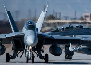 Two E/A-18G Growlers assigned to Electronic Attack Squadron (VAQ) 131 from Naval Air Station Whidbey Island, Washington, taxi at Nellis Air Force Base (AFB), Nevada, Jan. 23, 2020. 