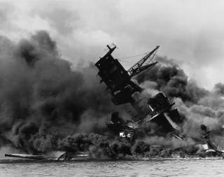 By Photographer: UnknownRetouched by: Mmxx - This is a retouched picture, which means that it has been digitally altered from its original version. The original can be viewed here: The USS Arizona (BB-39) burning after the Japanese attack on Pearl Harbor 