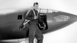 Chuck Yeager next to experimental aircraft Bell X-1 #1 Glamorous Glennis. 1940s. U.S. Air Force.