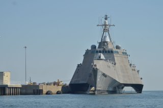 https://upload.wikimedia.org/wikipedia/commons/0/05/US_Navy_110912-N-AU606-002_The_littoral_combat_ship_USS_Independence_%28LCS_2%29_makes_preparations_at_Naval_Air_Station_Pensacola_before_getting_under.jpg