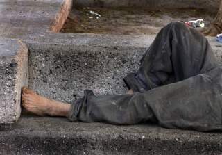 Homeless on bench, Hermosillo, Sonora, Mexico. 25 May 2009. Tomas Castelazo.