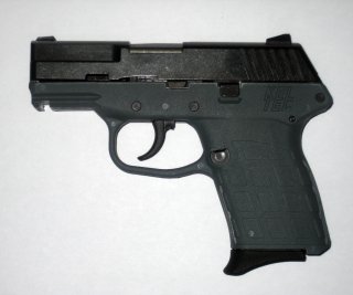 Side view of a Kel-Tec PF-9 9mm, semi-automatic, single stack magazine pistol. 18 Dec 2008. Wikimedia/Jchance.