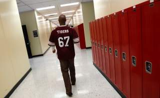 Walter H. Dyett High School principal Charles Campbell tours the school in Chicago, Illinois, in this photo taken on October 5, 2012. 