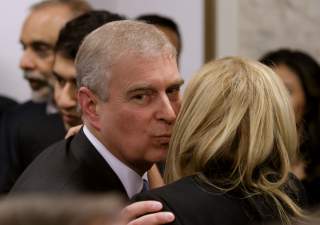 Britain's Prince Andrew greets a business leader during a reception at the sideline of the World Economic Forum in Davos January 22, 2015. REUTERS/Michel Euler/Pool 