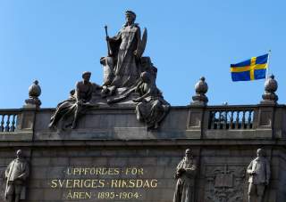 The Swedish flag flutters next to the Riksdag, the Swedish Parliament, in Stockholm, Sweden, May 7, 2017. REUTERS/Ints Kalnins