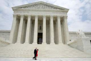 Associate Justice Neil Gorsuch walks his wife Louise during his investiture ceremony at the Supreme Court in Washington, U.S., June 15, 2017. REUTERS/Joshua Roberts