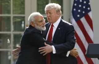 India's Prime Minister Narendra Modi hugs U.S. President Donald Trump as they give joint statements in the Rose Garden of the White House in Washington, U.S., June 26, 2017. REUTERS/Kevin Lamarque