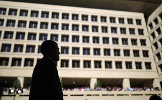 Federal Bureau of Investigation agents and employees listen to incoming FBI Director Christopher Wray speak after taking the oath of office at FBI headquarters in Washington, U.S., September 28, 2017. REUTERS/Carlos Barria