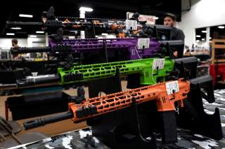 AR-15 rifles with colored hand guards are displayed for sale at the Guntoberfest gun show in Oaks, Pennsylvania, U.S., October 6, 2017. REUTERS/Joshua Roberts