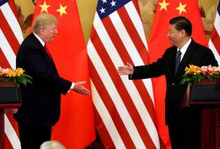 U.S. President Donald Trump and China's President Xi Jinping make joint statements at the Great Hall of the People in Beijing, China, November 9, 2017. REUTERS/Jonathan Ernst