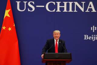 U.S. President Donald Trump delivers his speech as he and China's President Xi Jinping meet business leaders at the Great Hall of the People in Beijing, China, November 9, 2017. REUTERS/Damir Sagolj