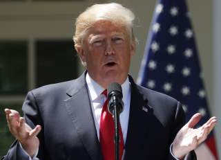 U.S. President Donald Trump addresses a joint news conference with Nigeria's President Muhammadu Buhari in the Rose Garden of the White House in Washington, U.S., April 30, 2018.