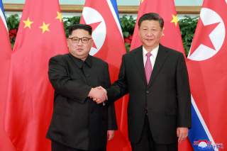 North Korean leader Kim Jong Un shakes hands with China's President Xi Jinping, in Dalian, China in this undated photo released on May 9, 2018 by North Korea's Korean Central News Agency (KCNA). KCNA/via REUTERS ATTENTION EDITORS - THIS PICTURE WAS PROVID