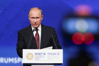 Russian President Vladimir Putin delivers a speech during a session of the St. Petersburg International Economic Forum (SPIEF), Russia May 25, 2018