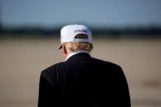 U.S. President Donald Trump walks from Air Force One as he returns from Bedminster, New Jersey, at Joint Base Andrews in Maryland, U.S., July 8, 2018. REUTERS/Joshua Roberts TPX IMAGES OF THE DAY