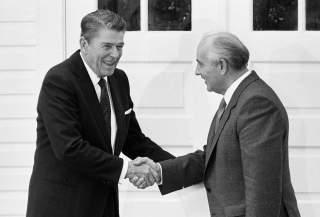 U.S. President Ronald Reagan and Soviet President Mikhail Gorbachev shake hands after their mini-summit meeting in Reykjavik October 12, 1986. REUTERS/Denis Paquin/File Photo