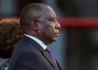 President Cyril Ramaphosa arrives to deliver his State of the Nation address at Parliament in Cape Town, South Africa, February 16, 2018. REUTERS/Gianluigi Guercia//File Photo