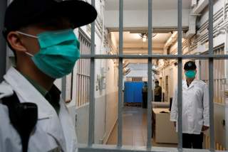 Correctional Services Department officers on patrol inside the special wards for drug tests and patients at Lai Chi Kok Reception Centre, a maximum security institution for detainees and judgement respited prisoners, in Hong Kong, China November 8, 2018.