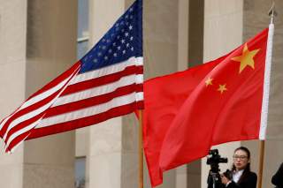 U.S. and Chinese flags are seen before Defense Secretary James Mattis welcomes Chinese Minister of National Defense Gen. Wei Fenghe to the Pentagon in Arlington, Virginia, U.S., November 9, 2018. REUTERS/Yuri Gripas