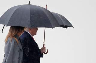 U.S. President Donald Trump and U.S. first lady Melania Trump attend a commemoration ceremony for Armistice Day, 100 years after the end of World War One, at the Arc de Triomphe, in Paris, France, November 11, 2018. REUTERS/Yves Herman