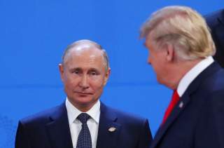 U.S. President Donald Trump and Russia's President Vladimir Putin are seen during the G20 leaders summit in Buenos Aires, Argentina November 30, 2018. REUTERS/Marcos Brindicci