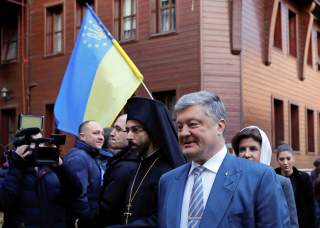 Ukrainian President Petro Poroshenko and his wife Maryna arrive for the Epiphany mass at the Patriarchal Cathedral of St. George in Istanbul, Turkey January 6, 2019. REUTERS/Murad Sezer