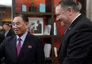 U.S. Secretary of State Mike Pompeo escorts Vice Chairman of the North Korean Workers' Party Committee Kim Yong Chol, North Korea's lead negotiator in nuclear diplomacy with the United States, into talks aimed at clearing the way for a second U.S.-North K