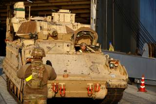 U.S. Army Bradley Cavalry Fighting Vehicle leaves ship during operation Atlantic Resolve rotation in Riga port, Latvia October 16, 2019. REUTERS/Ints Kalnins