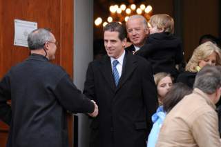 FILE PHOTO: U.S. Vice President Joe Biden and his son Hunter Biden depart after a pre-inauguration church service in Washington, U.S., January 18, 2009. REUTERS/Jonathan Ernst/File Photo