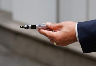 A man uses a vape device in Seoul, South Korea, October 23, 2019. REUTERS/Heo Ran