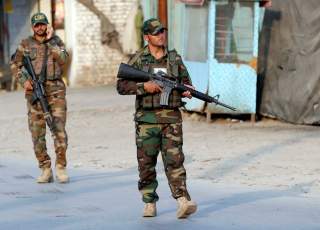 Afghan National Army (ANA) soldiers arrive at the site of a suicide car bomb blast in Jalalabad, Afghanistan October 25, 2019.REUTERS/Parwiz