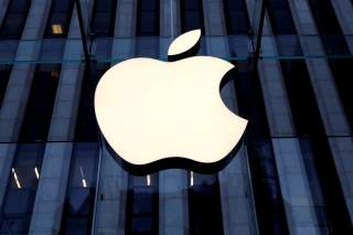 The Apple Inc. logo is seen hanging at the entrance to the Apple store on 5th Avenue in Manhattan, New York, U.S., October 16, 2019. REUTERS/Mike Segar