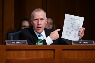 Sen. Thom Tillis (R-NC) points to a FBI chain of command chart as he questions U.S. Justice Department Inspector General Michael Horowitz (not pictured) during a Senate Judiciary Committee hearing