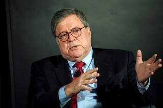 FILE PHOTO: U.S. Attorney General William Barr speaks during the Wall Street Journal CEO Council, in Washington, U.S., December 10, 2019. REUTERS/Al Drago/File Photo