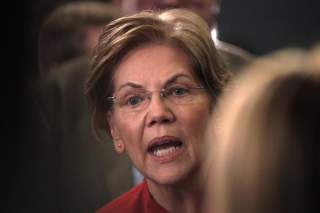 Senator Elizabeth Warren does an interview in the spin room after the sixth 2020 U.S. Democratic presidential candidates campaign debate at Loyola Marymount University in Los Angeles, California, U.S., December 19, 2019. REUTERS/Kyle Grillot