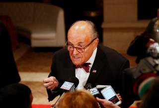 U.S. President Donald Trump's personal lawyer Rudy Giuliani is interviewed by the press at the Mar-a-Lago resort in Palm Beach, Florida, U.S. December 31, 2019. REUTERS/Tom Brenner