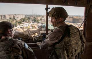 U.S. Army soldiers keep watch on the U.S. embassy compound in Baghdad, Iraq January 1, 2020. DoD/Lt. Col. Adrian Weale/Handout